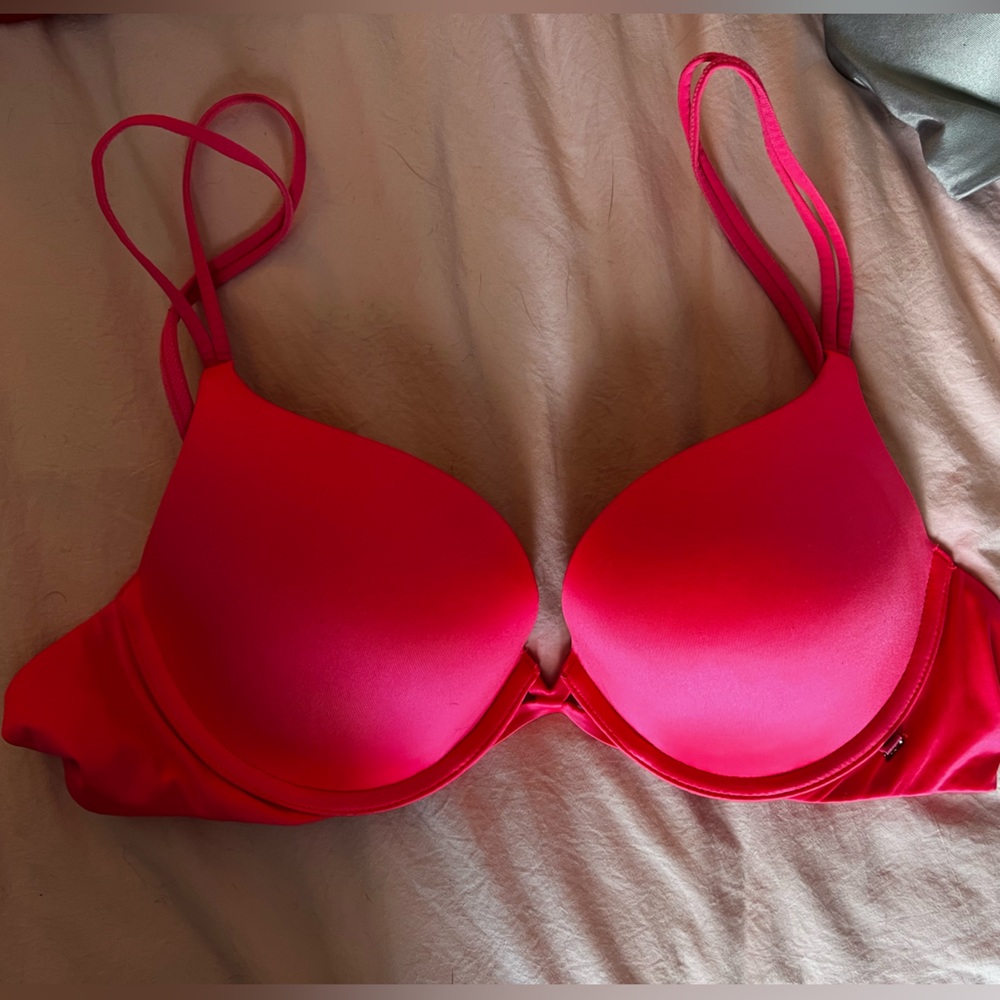 Victoria’s Secret very sexy push up. Hot pink 34B